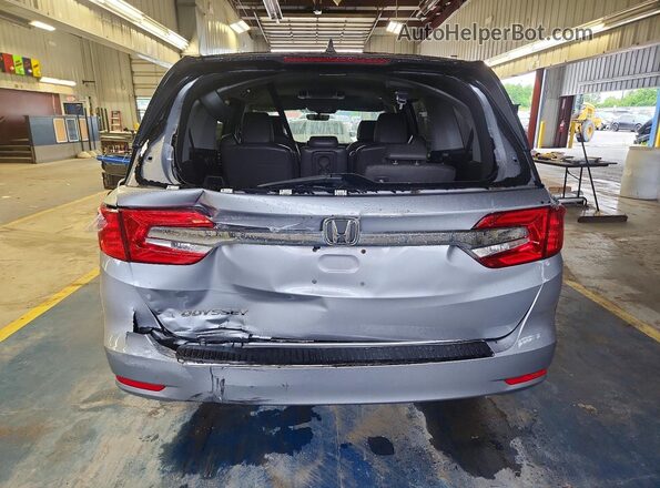 5FNRL6H73JB013203 2018 HONDA ODYSSEY Silver Rear view