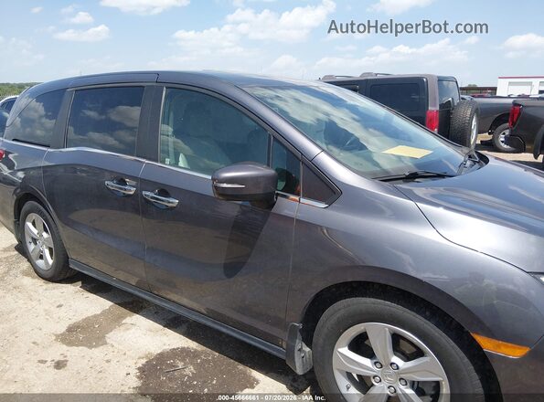 5FNRL6H79JB082039 2018 HONDA ODYSSEY Gray Widok wnętrza z tyłu