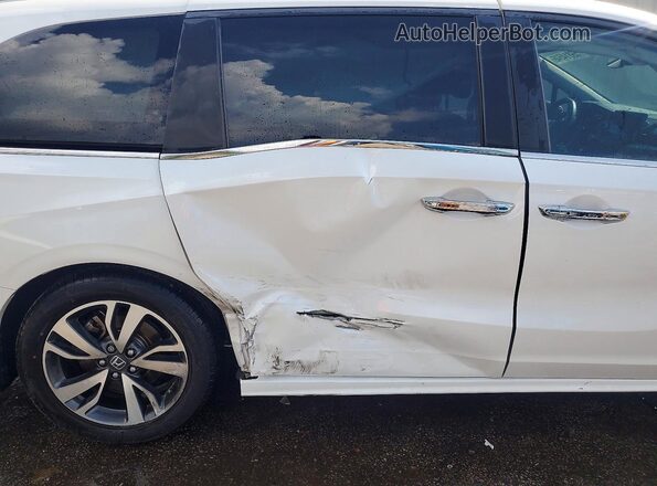 5FNRL6H80PB022202 2023 HONDA ODYSSEY White Սալոնի հետևի տեսք