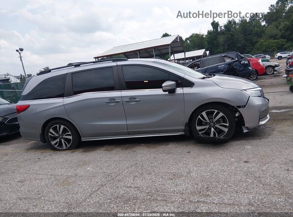 5FNRL6H81PB020698 2023 HONDA ODYSSEY Gray Widok wnętrza z tyłu