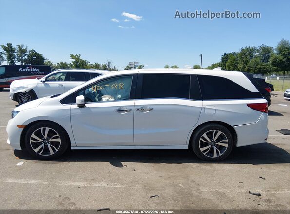 5FNRL6H85PB004701 2023 HONDA ODYSSEY White Սալոնի հետևի տեսք