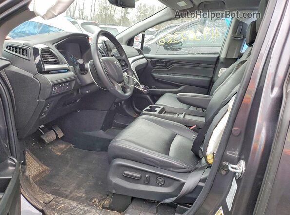 5FNRL6H86PB039652 2023 HONDA ODYSSEY Серый Вид салона спереди