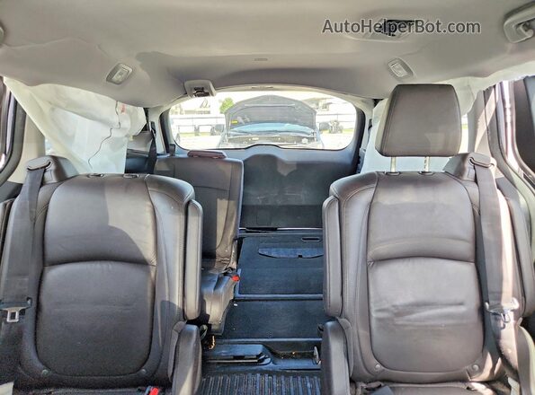 5FNRL6H88JB075558 2018 HONDA ODYSSEY Silver Rear seats view