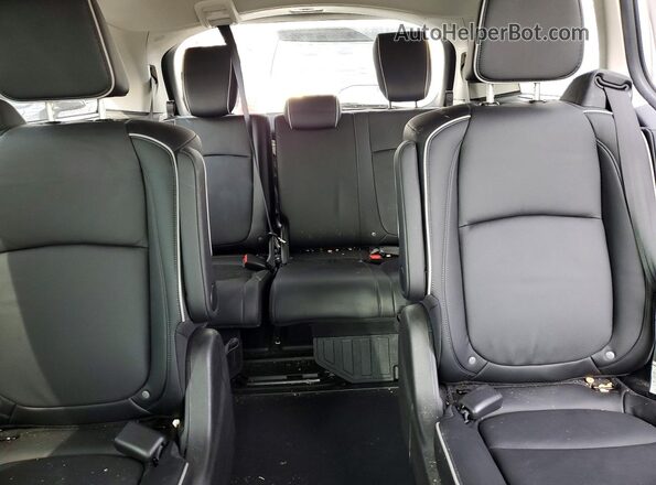 5FNRL6H8XSB004735 2025 HONDA ODYSSEY White Rear seats view