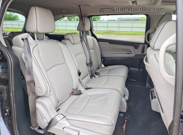 5FNRL6H96PB064530 2023 HONDA ODYSSEY Blue Rear interior view