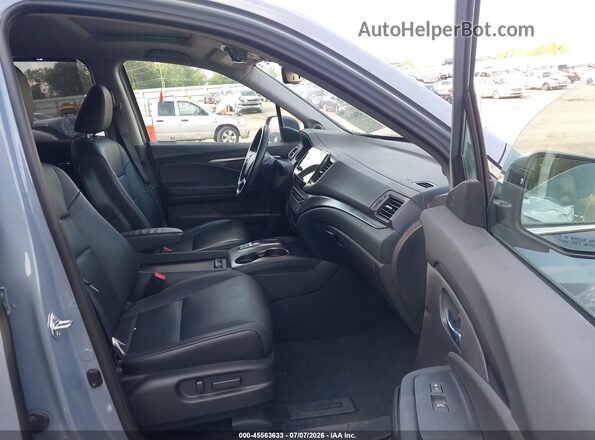 5FNYF5H22NB031358 2022 HONDA PILOT Blue Front interior view