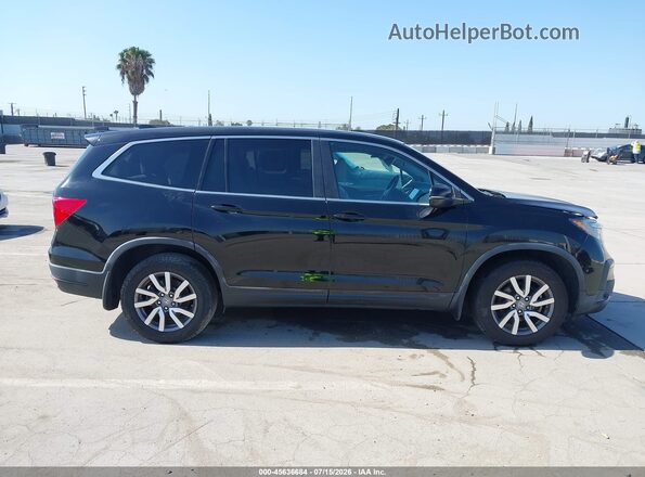5FNYF5H33KB026271 2019 HONDA PILOT Black Rear interior view
