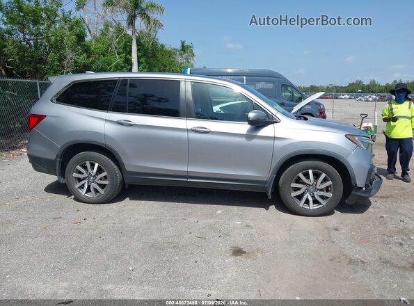 5FNYF5H3XKB042077 2019 HONDA PILOT Silver Սալոնի հետևի տեսք