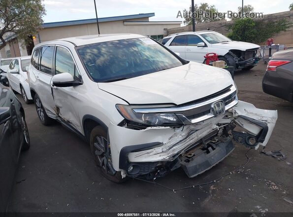 5FNYF5H42KB021720 2019 HONDA PILOT White Rear interior view