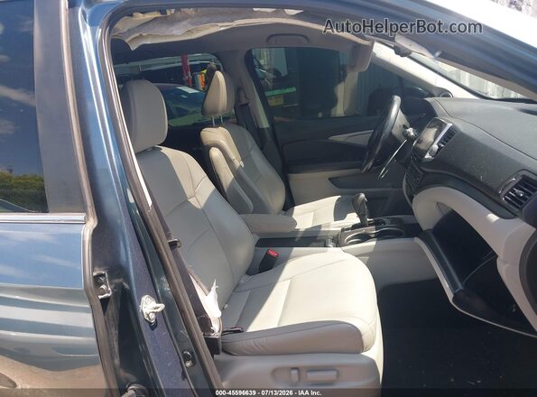 5FNYF5H50JB025112 2018 HONDA PILOT Blue Front interior view