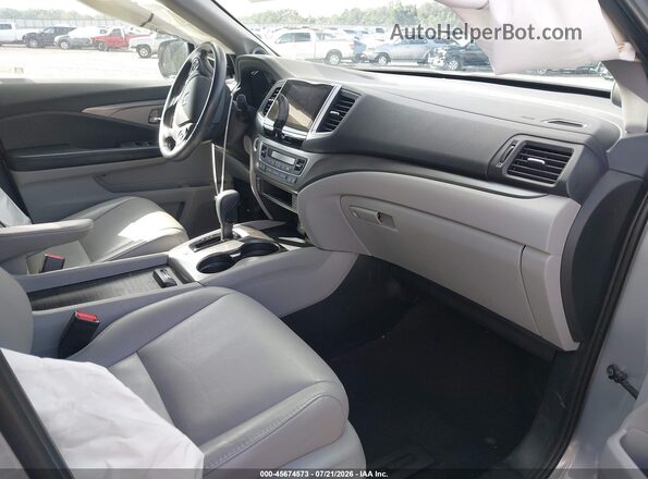 5FNYF5H55JB007575 2018 HONDA PILOT Silver Widok wnętrza z przodu