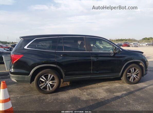 5FNYF5H56JB005141 2018 HONDA PILOT Black Rear interior view