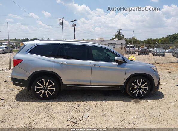 5FNYF5H69KB030772 2019 HONDA PILOT Серебряный Вид задней части салона
