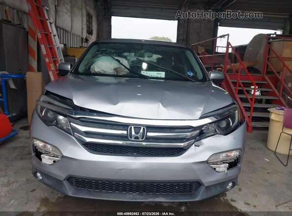 5FNYF5H70JB013706 2018 HONDA PILOT Silver Widok wnętrza z tyłu