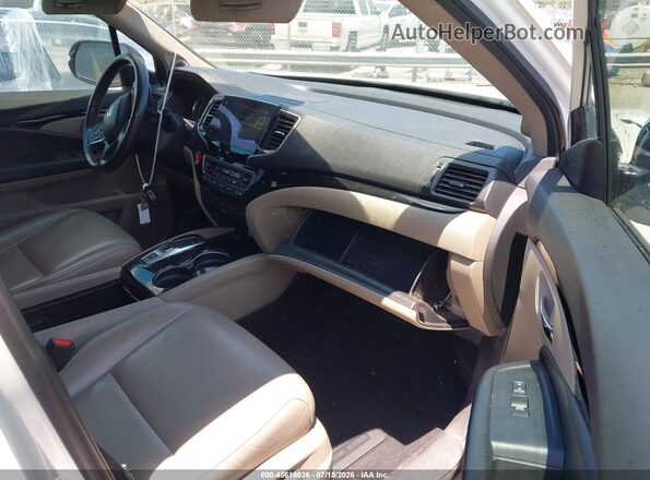 5FNYF5H90KB038978 2019 HONDA PILOT Белый Вид салона спереди