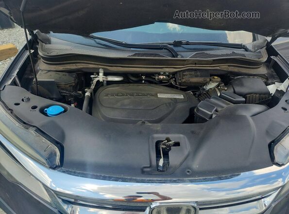 5FNYF5H91KB022658 2019 HONDA PILOT Gray Rear interior view
