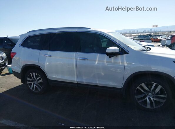 5FNYF5H93HB025148 2017 HONDA PILOT White Rear interior view