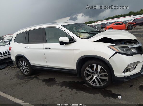 5FNYF5H95HB005872 2017 HONDA PILOT Белый Вид задней части салона