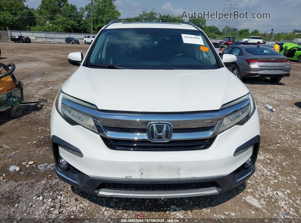 5FNYF6H05KB061244 2019 HONDA PILOT White Vista interior trasera