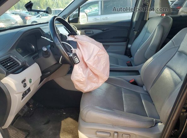 5FNYF6H07KB047765 2019 HONDA PILOT Black Вид салону спереду