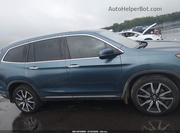 5FNYF6H07KB089031 2019 HONDA PILOT Blue Rear interior view