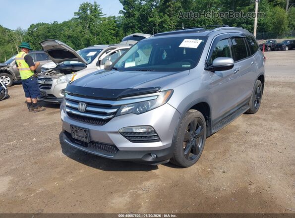 5FNYF6H09HB034556 2017 HONDA PILOT Silver Front left