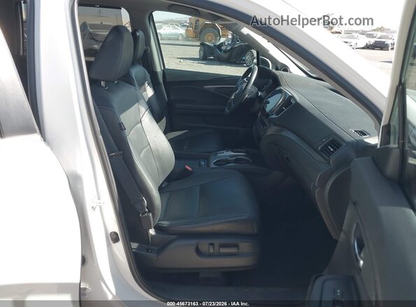 5FNYF6H23MB050313 2021 HONDA PILOT White Front interior view