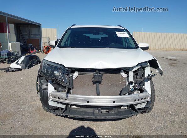 5FNYF6H23MB050313 2021 HONDA PILOT White Rear interior view