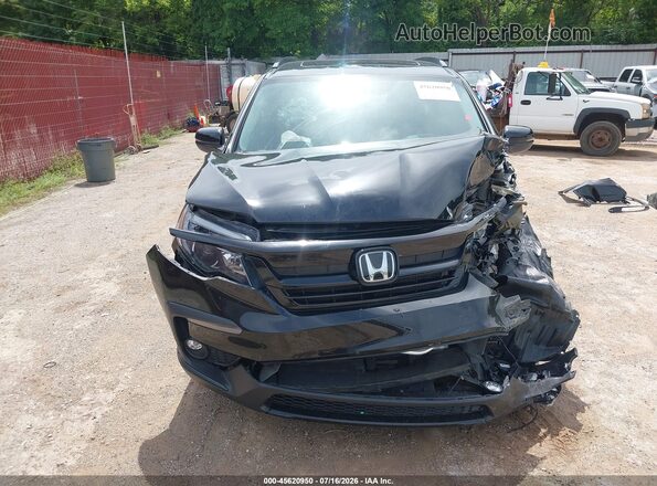 5FNYF6H29NB077517 2022 HONDA PILOT Black Вид задньої частини салону