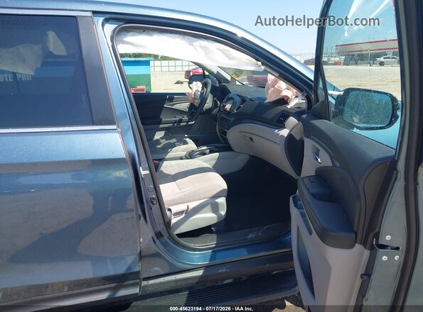 5FNYF6H30MB072326 2021 HONDA PILOT Синий Вид салона спереди