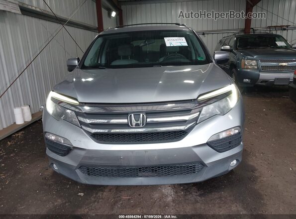 5FNYF6H34JB060496 2018 HONDA PILOT Серебряный Вид задней части салона
