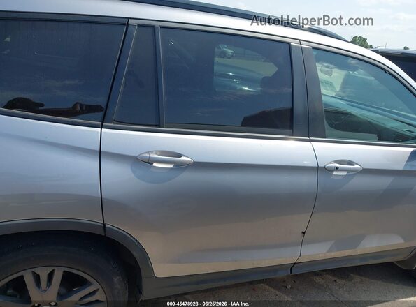 5FNYF6H34NB073545 2022 HONDA PILOT Light Blue Вид задньої частини салону
