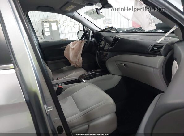 5FNYF6H36MB071083 2021 HONDA PILOT Серебряный Вид салона спереди