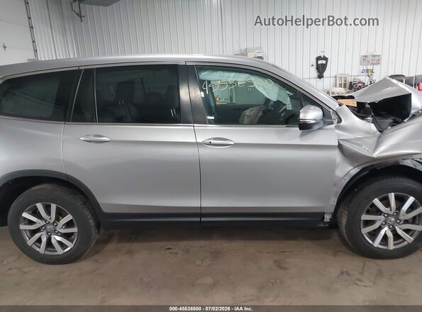 5FNYF6H36MB071083 2021 HONDA PILOT Серебряный Вид задней части салона