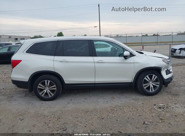 5FNYF6H45HB031429 2017 HONDA PILOT White Rear interior view