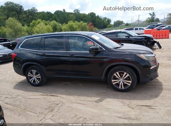 5FNYF6H50HB063973 2017 HONDA PILOT Black Widok wnętrza z tyłu