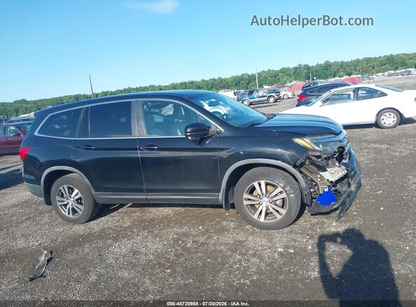 5FNYF6H50HB073029 2017 HONDA PILOT Black Rear interior view