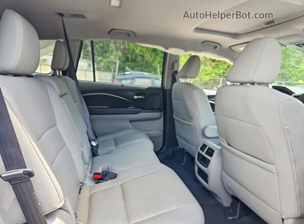 5FNYF6H50MB007476 2021 HONDA PILOT Silver Rear interior view