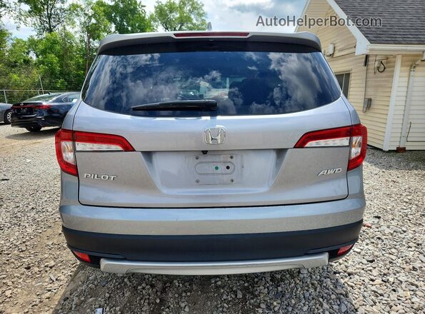 5FNYF6H50MB007476 2021 HONDA PILOT Silver Rear view