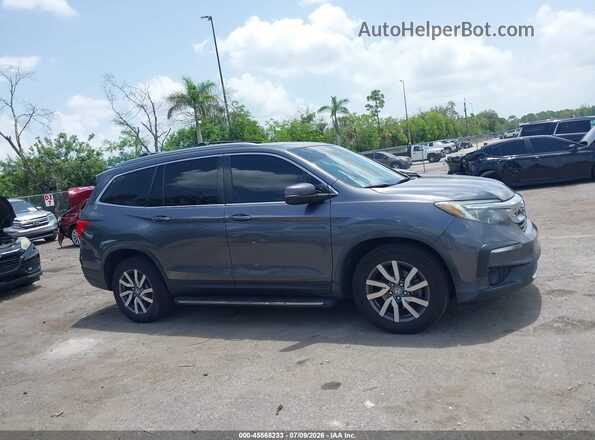 5FNYF6H52LB033477 2020 HONDA PILOT Gray Rear interior view