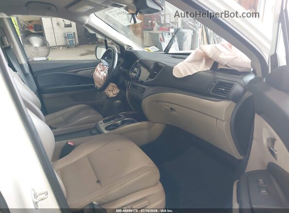 5FNYF6H53KB063389 2019 HONDA PILOT White Front interior view