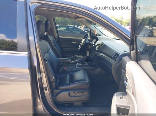 5FNYF6H53KB095999 2019 HONDA PILOT Gray Вид салону спереду