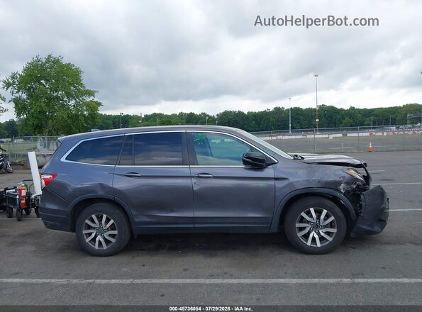 5FNYF6H53MB051794 2021 HONDA PILOT Gray Widok wnętrza z tyłu