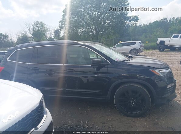 5FNYF6H54HB037439 2017 HONDA PILOT Black Вид задньої частини салону