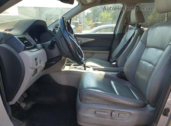 5FNYF6H54MB088773 2021 HONDA PILOT Silver Front interior view