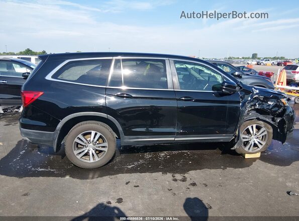 5FNYF6H55HB047509 2017 HONDA PILOT Black Вид задньої частини салону