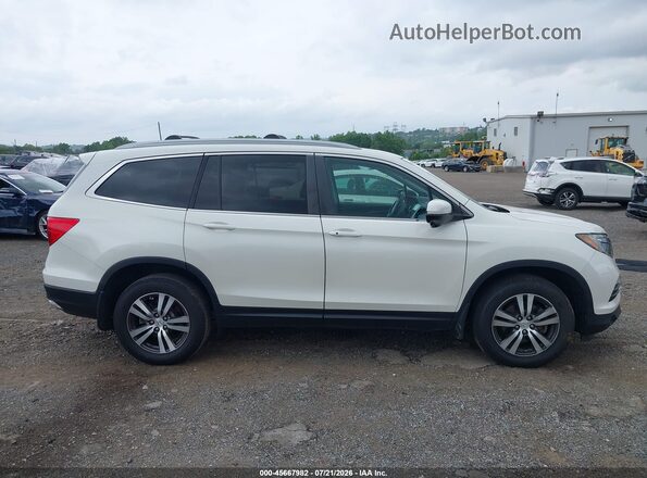 5FNYF6H55JB019098 2018 HONDA PILOT White Սալոնի հետևի տեսք