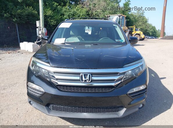 5FNYF6H56GB091579 2016 HONDA PILOT Black Вид задньої частини салону