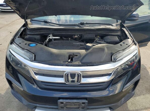 5FNYF6H56KB000674 2019 HONDA PILOT Black Вид задньої частини салону