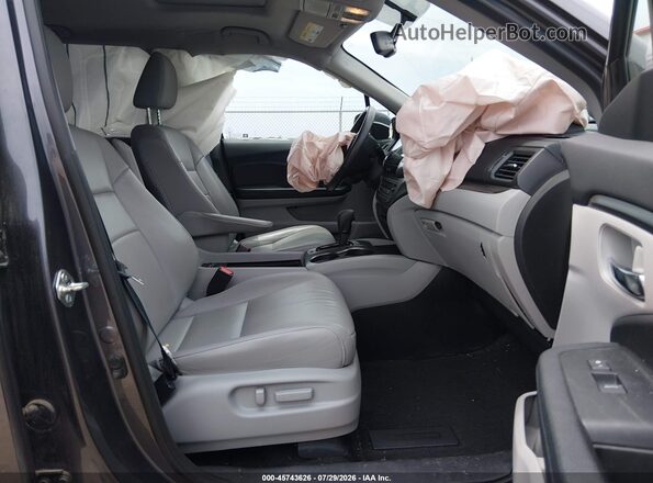5FNYF6H57HB043090 2017 HONDA PILOT Gray Вид салону спереду